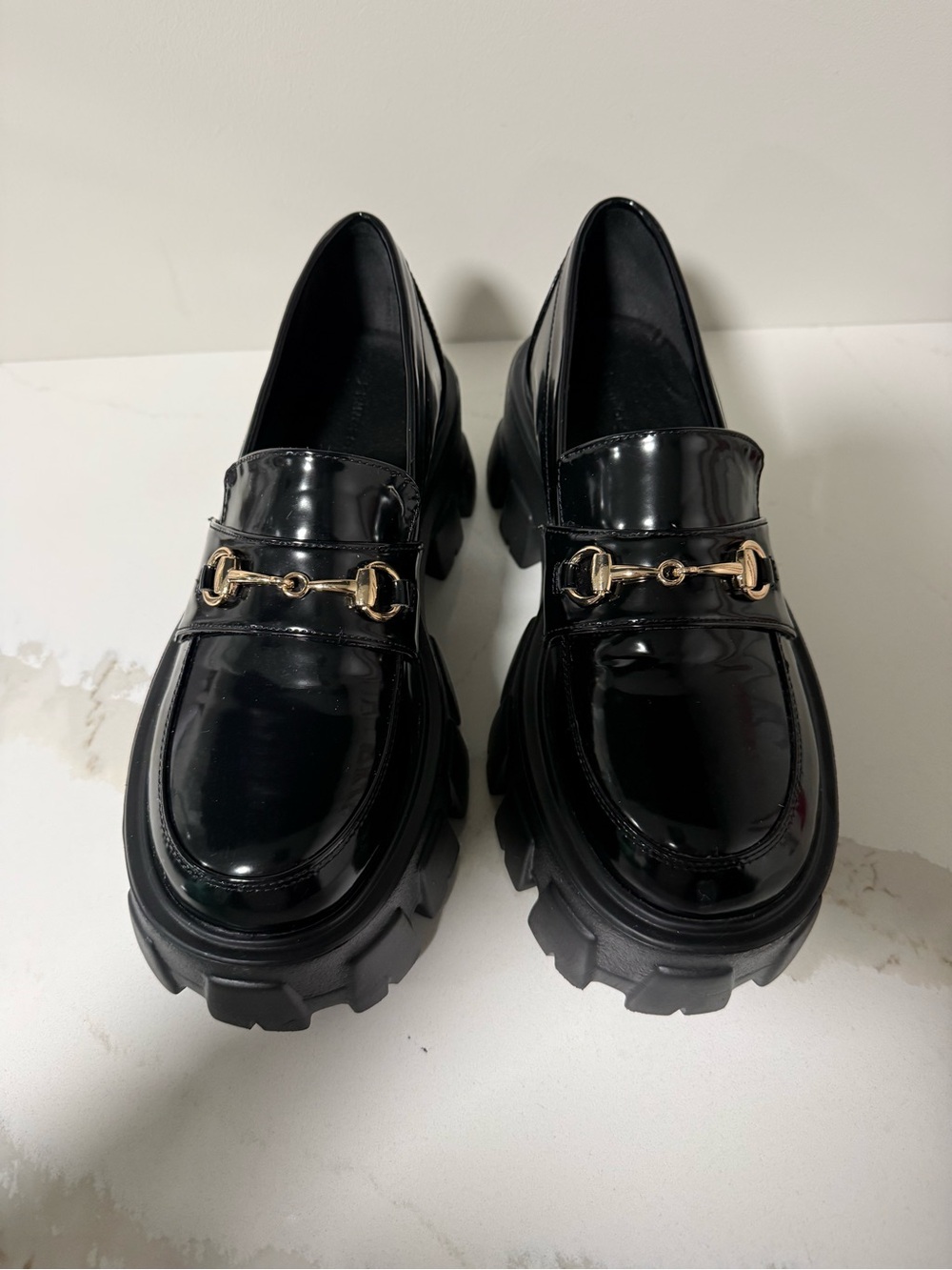 Princess Polly Black Patent Lug Sole Loafers with Gold Bit Hardware